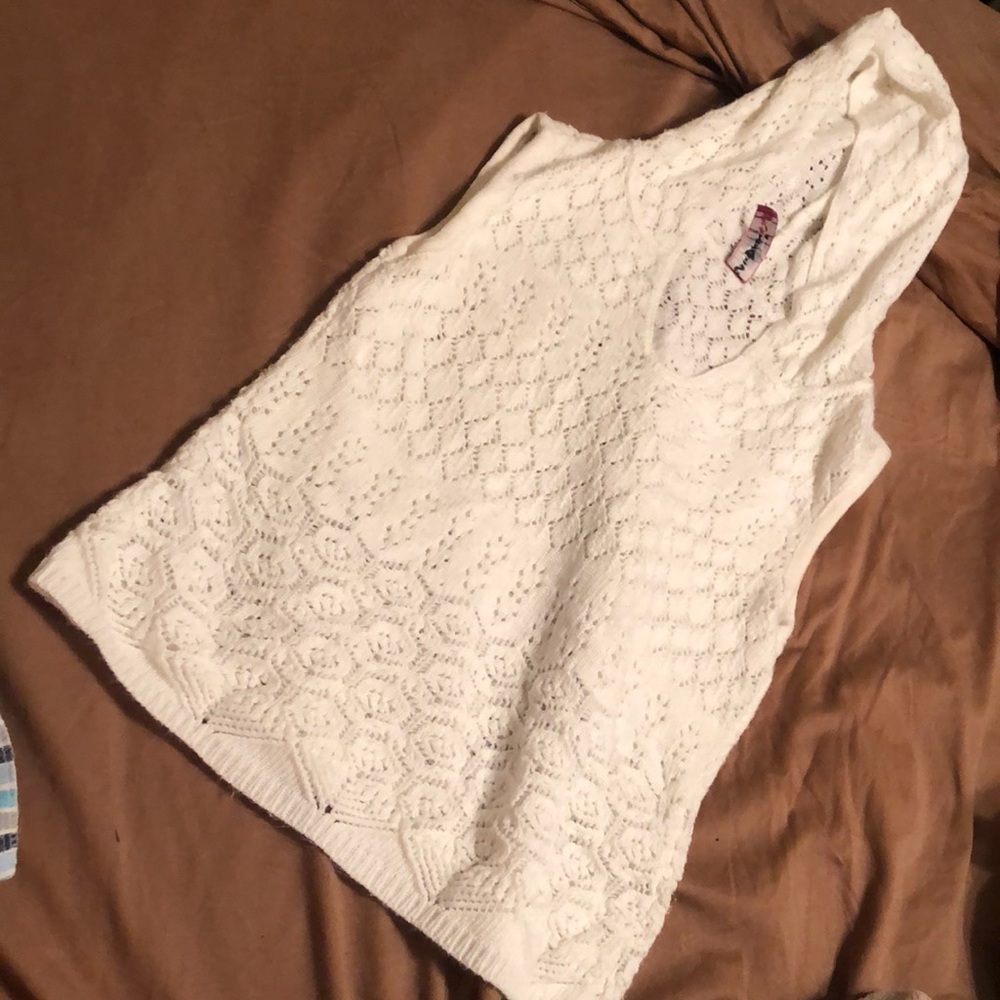 Hooded sleeveless sweater